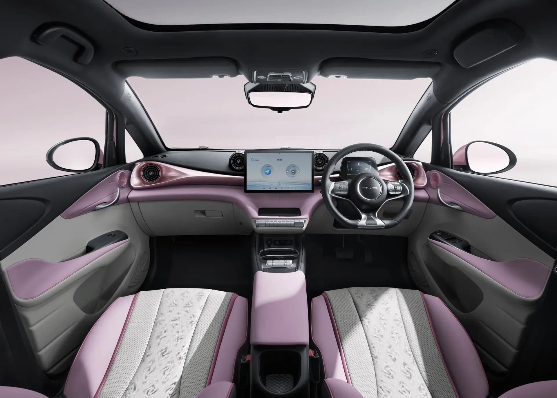 Kabin depan BYD Dolphin dengan interior Pink + Grey dan setir di kanan